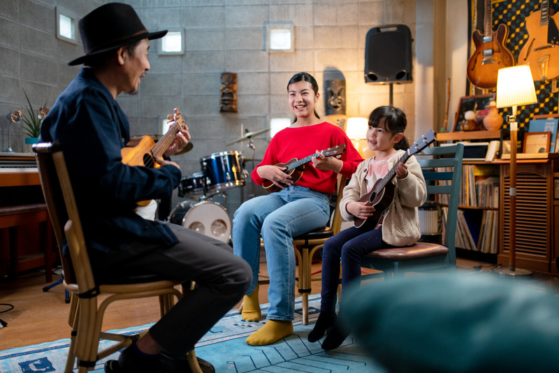 Students learning ukulele